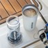 AEROPRESS Go Plus set aparata za kavu s termo šalicom, 45 papirnatih filtera, sklopivom miješalicom i mjernom posudom