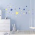 AMBIANCE Set od 50 zidnih samoljepljivih naljepnica Stars Blue and Yellow