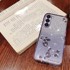 Maska za Samsung Galaxy S23, cvijet s svjetlucavim efektom, ljubičasta