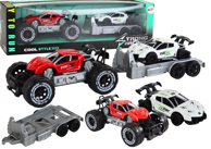 Terensko vozilo s prikolicom za vuču i malim bijelim automobilom