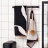 METTE DITMER DENMARK Crno-bijeli ručnik od organskog pamuka 70x133 cm Nova Arte